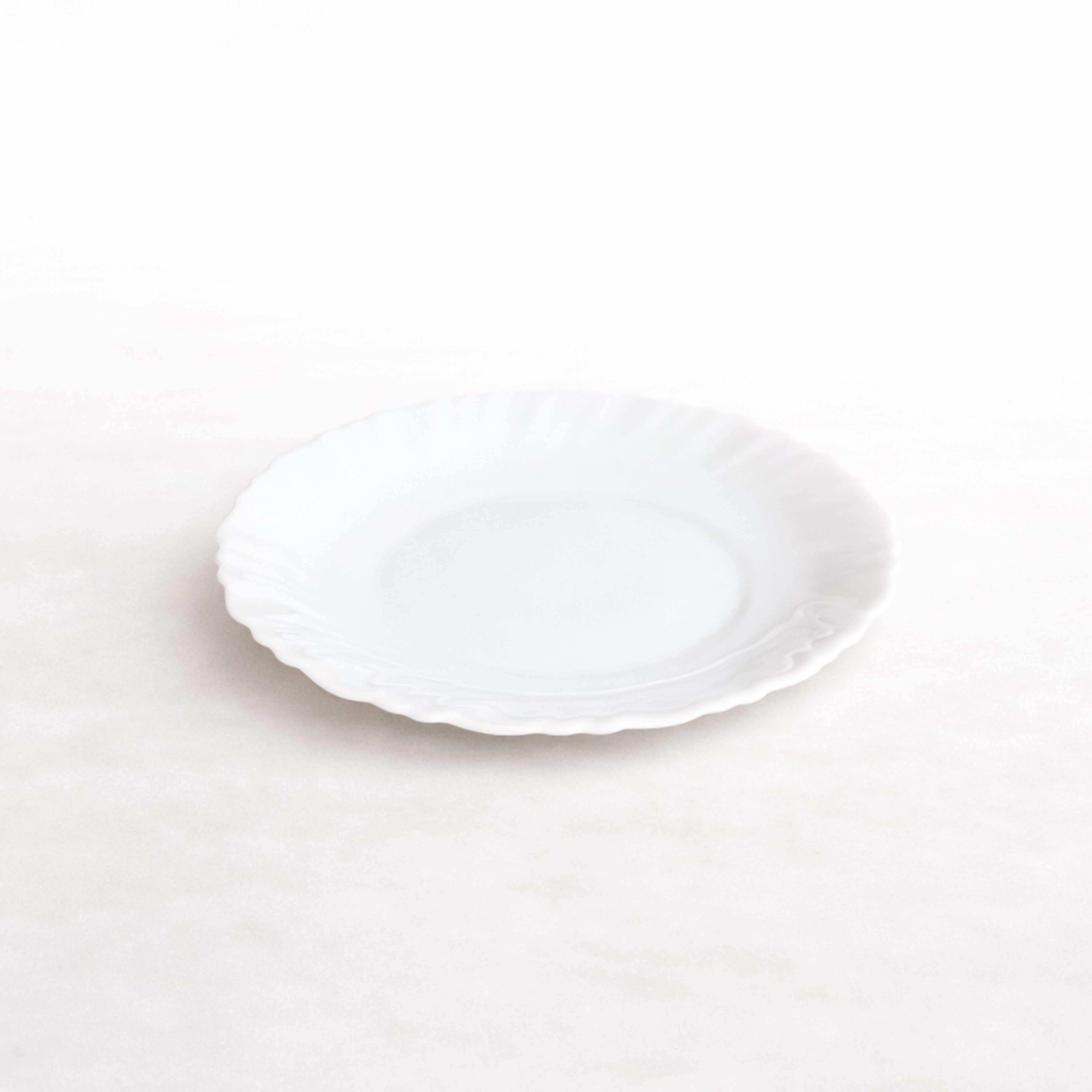 Assiette festonnée à fromage